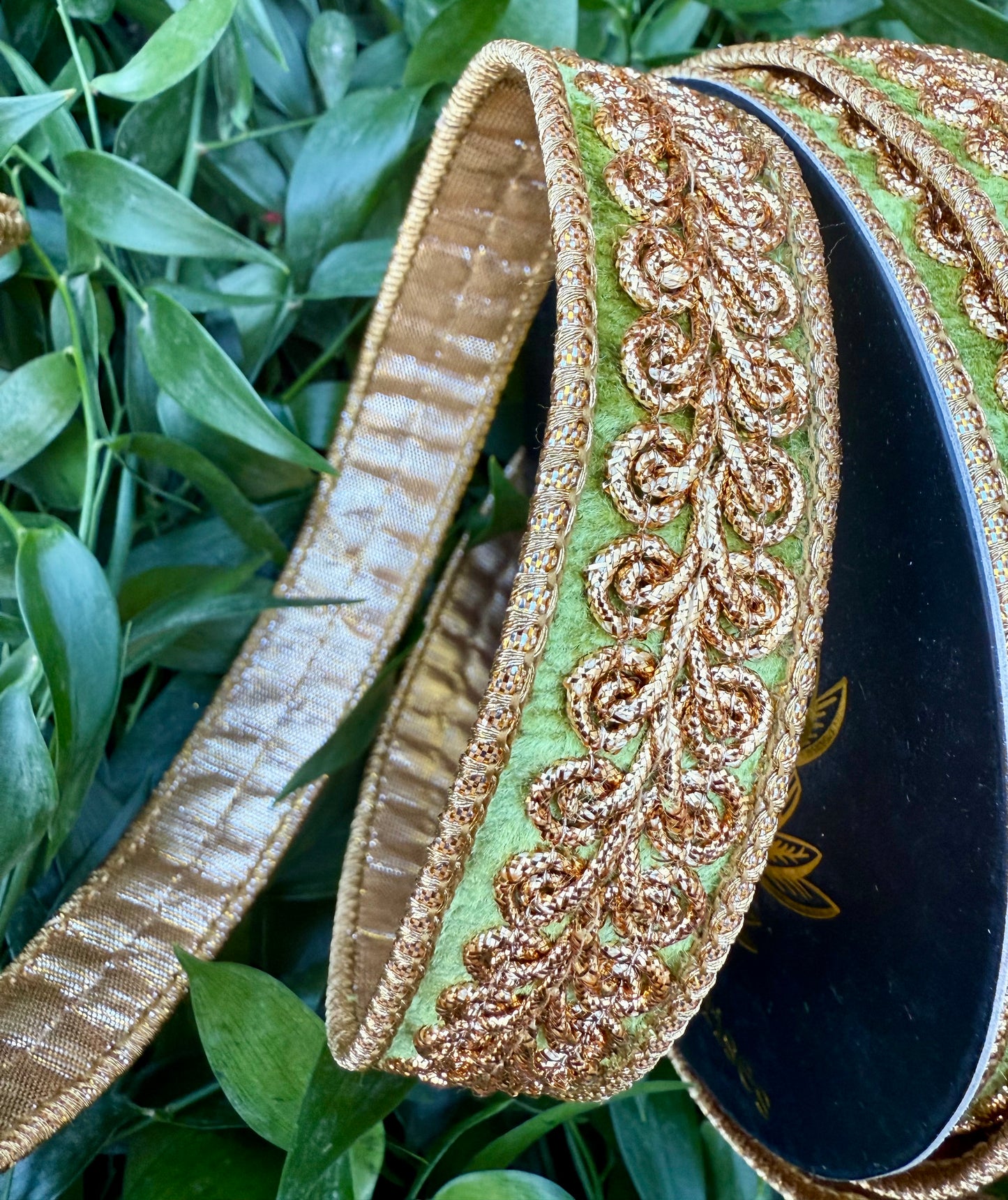 JME heavy wired ribbon. Apple Green velvet with gold embroidered design and back with gold metallic. 1“ x 10 yards.