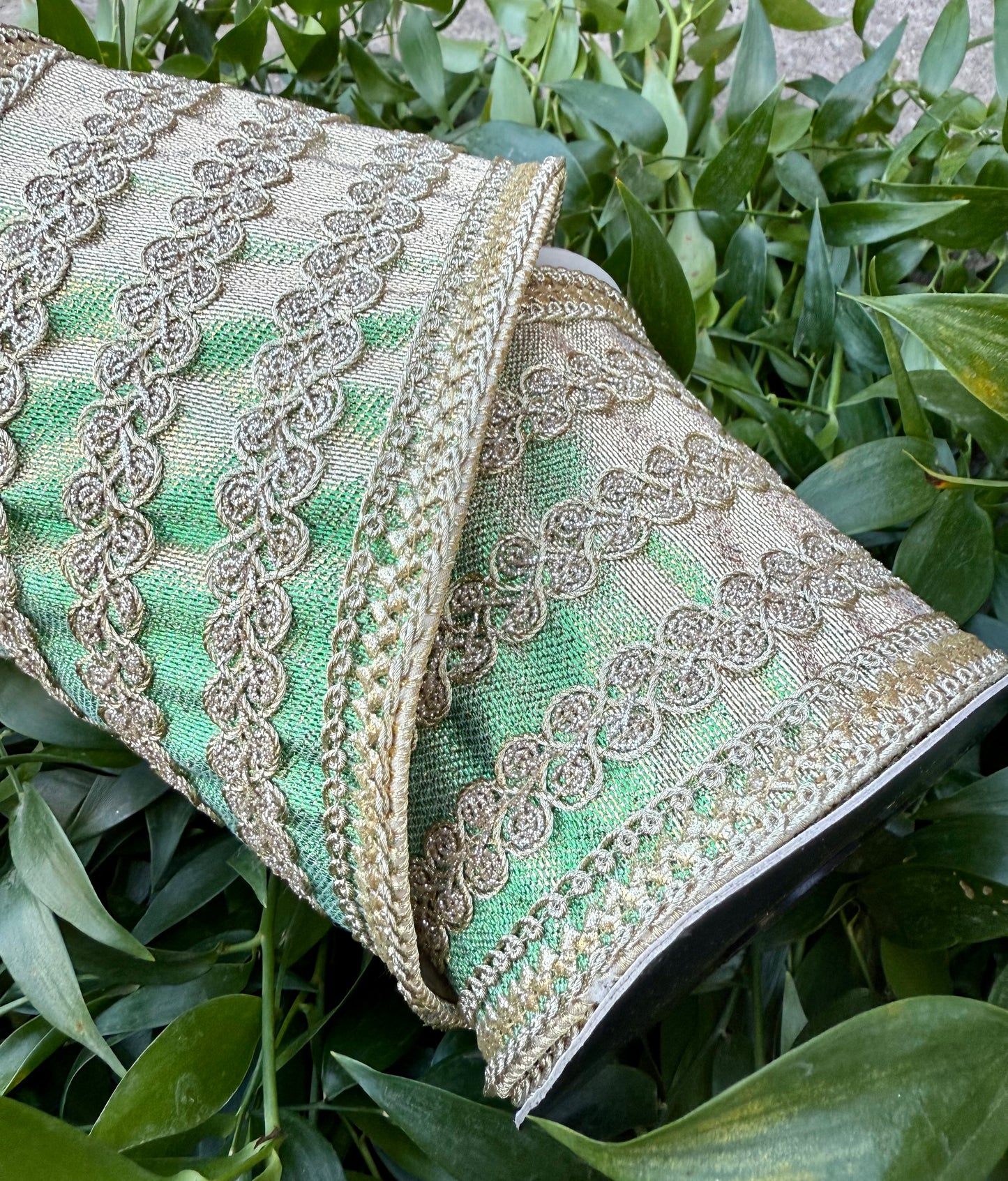 JME heavy wired ribbon. Metallic taffeta with gold bands and trim. Green metallic 5 yards x 4”.