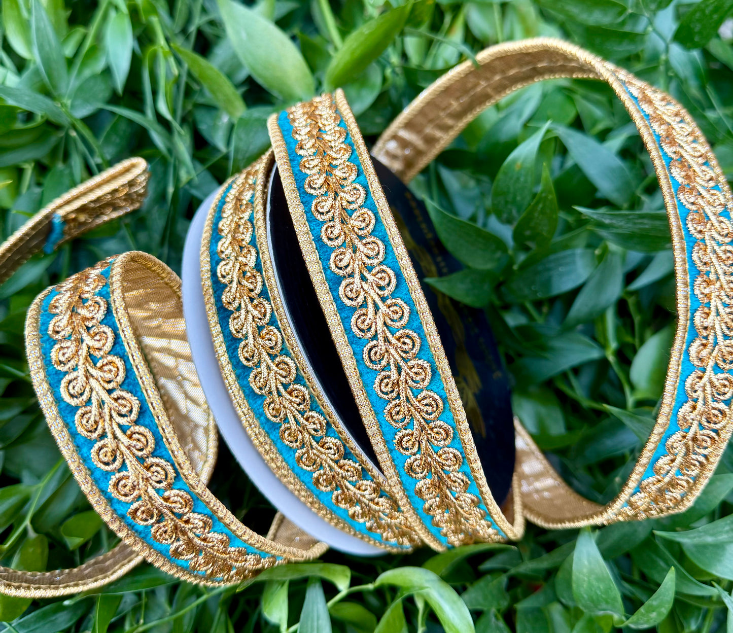 JME heavy wired ribbon. TEAL velvet with gold embroidered design and back with gold metallic. 1“ x 10 yards.