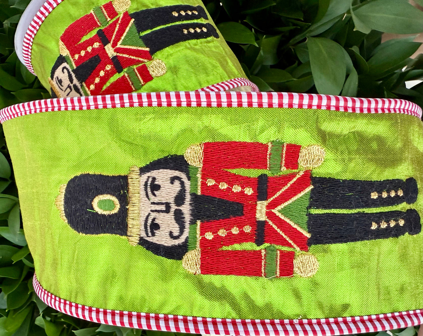 JME heavy wired ribbon. LIME Metallic with Embroidered Nutcracker 4"x 10YDS