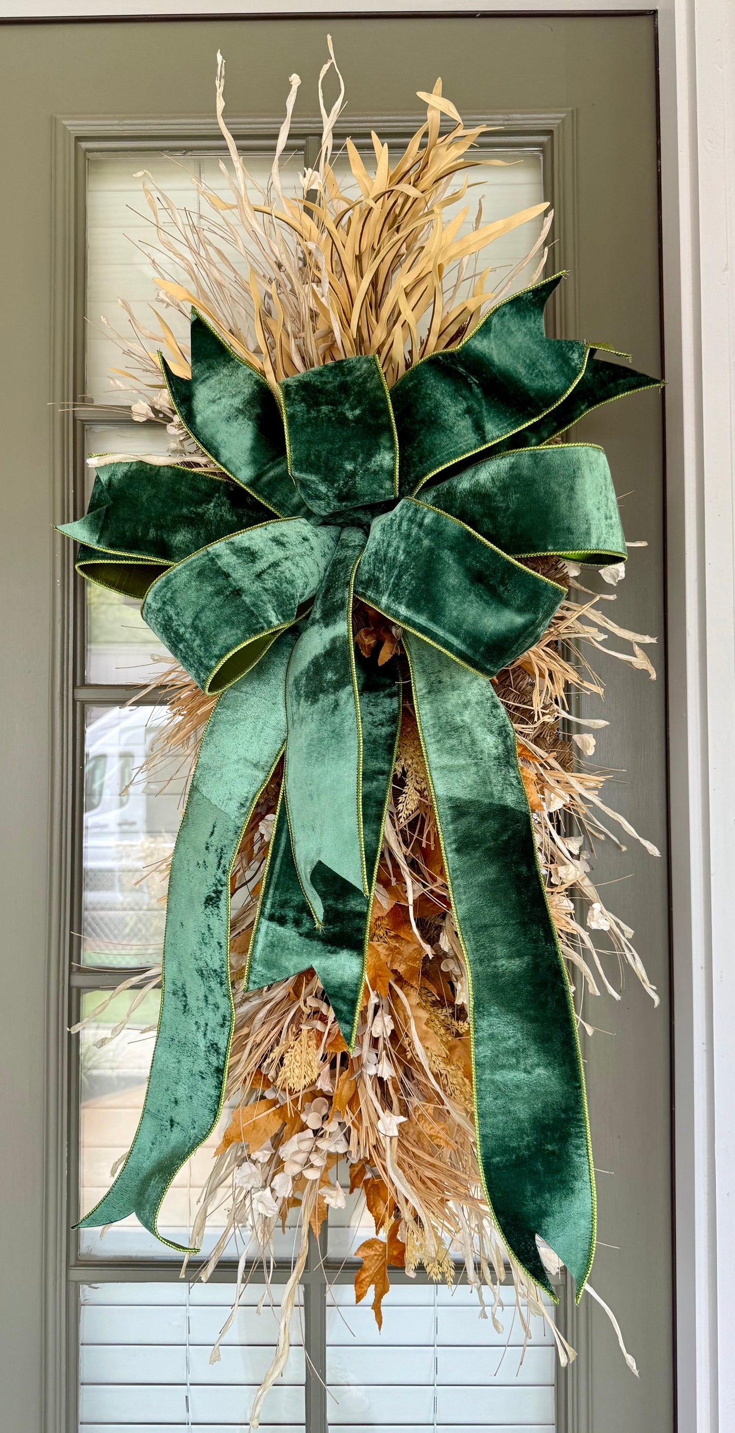 Faux fall swag with JME green velvet bow.