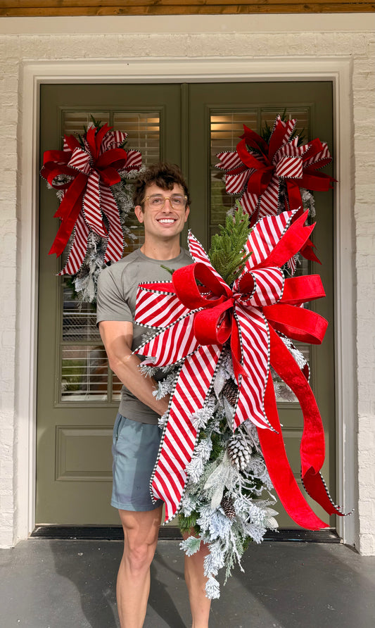 Candy Cain inspired door swag. Flocked and paired with a JME hand-tied bow.