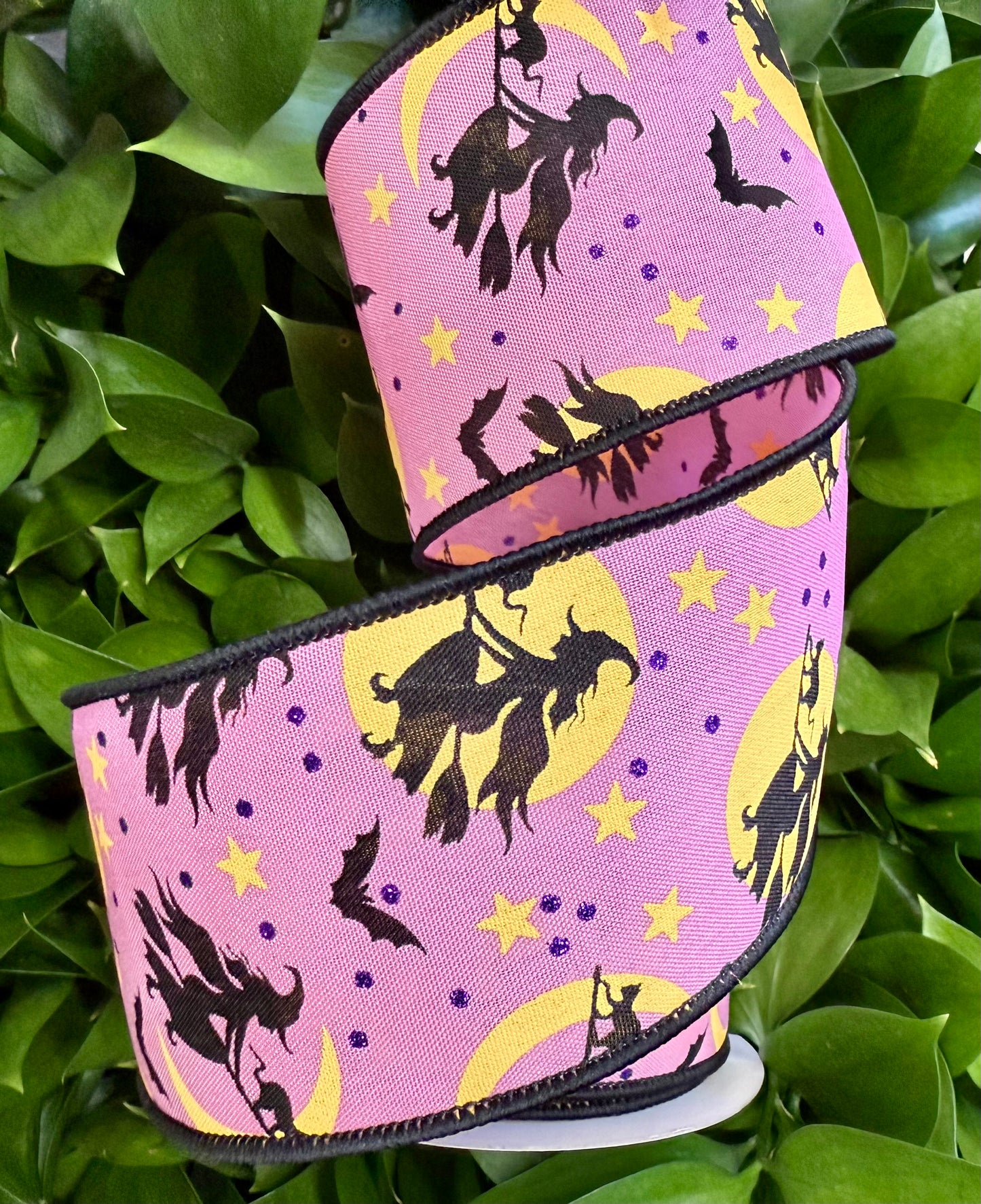 Pink Halloween ribbon with witches and bats. Wired ribbon. 2.5” x 10 yards.