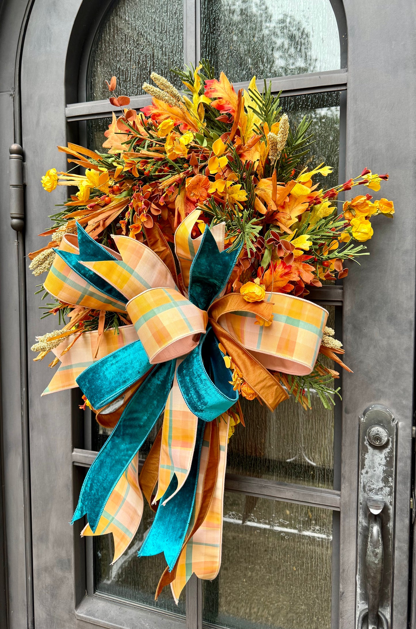 Teal for fall! JME handmade wreath with a JME hand tied bow! About 24 inches wide 