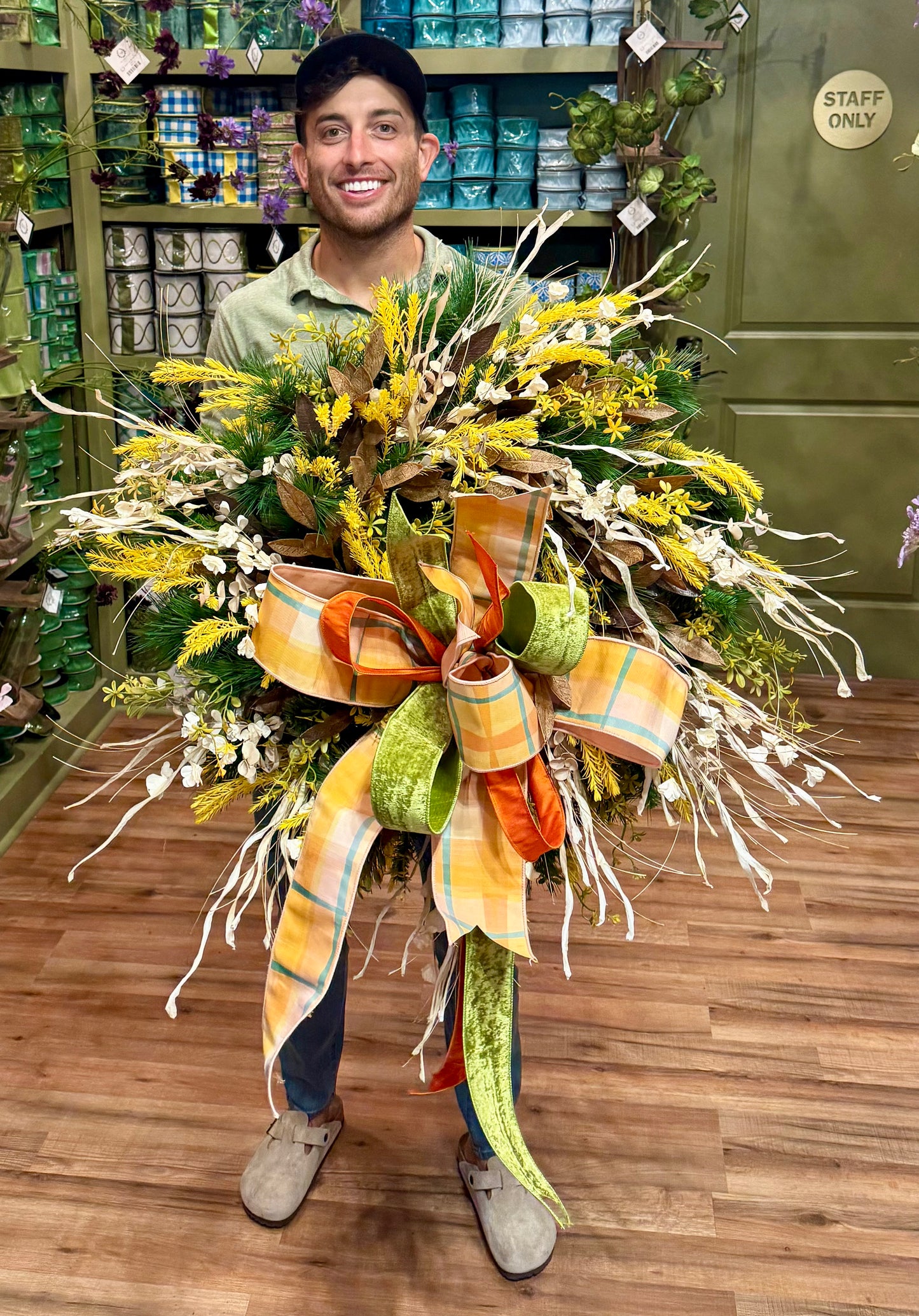 JME MADE faux fall wreath with mixed grasses, leaves, and YELLOW sprigs. About 25 inches wide
