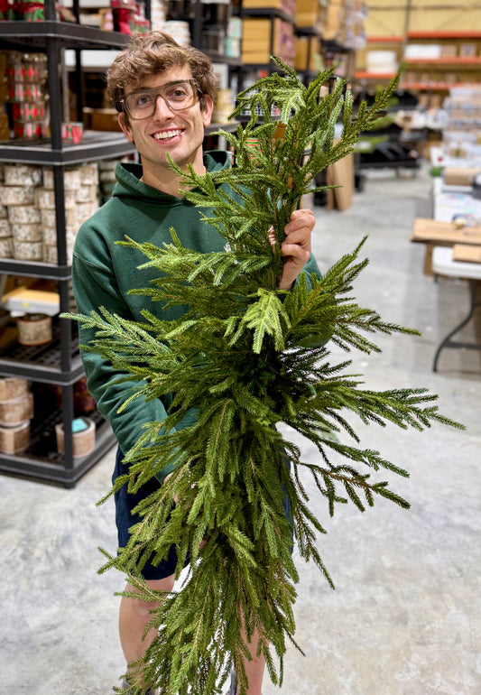 Faux Winter foliage swag. Real touch. About 36 inches long.