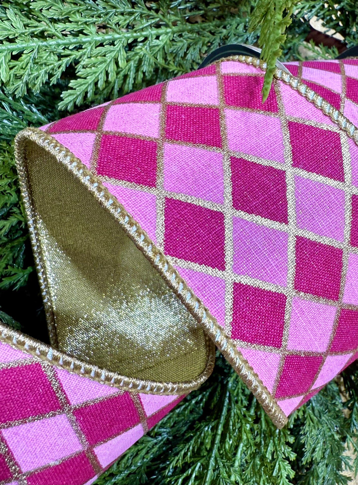Wired ribbon. Harlequin pink and dark pink with gold backing. 2.5inches by 5 yards.