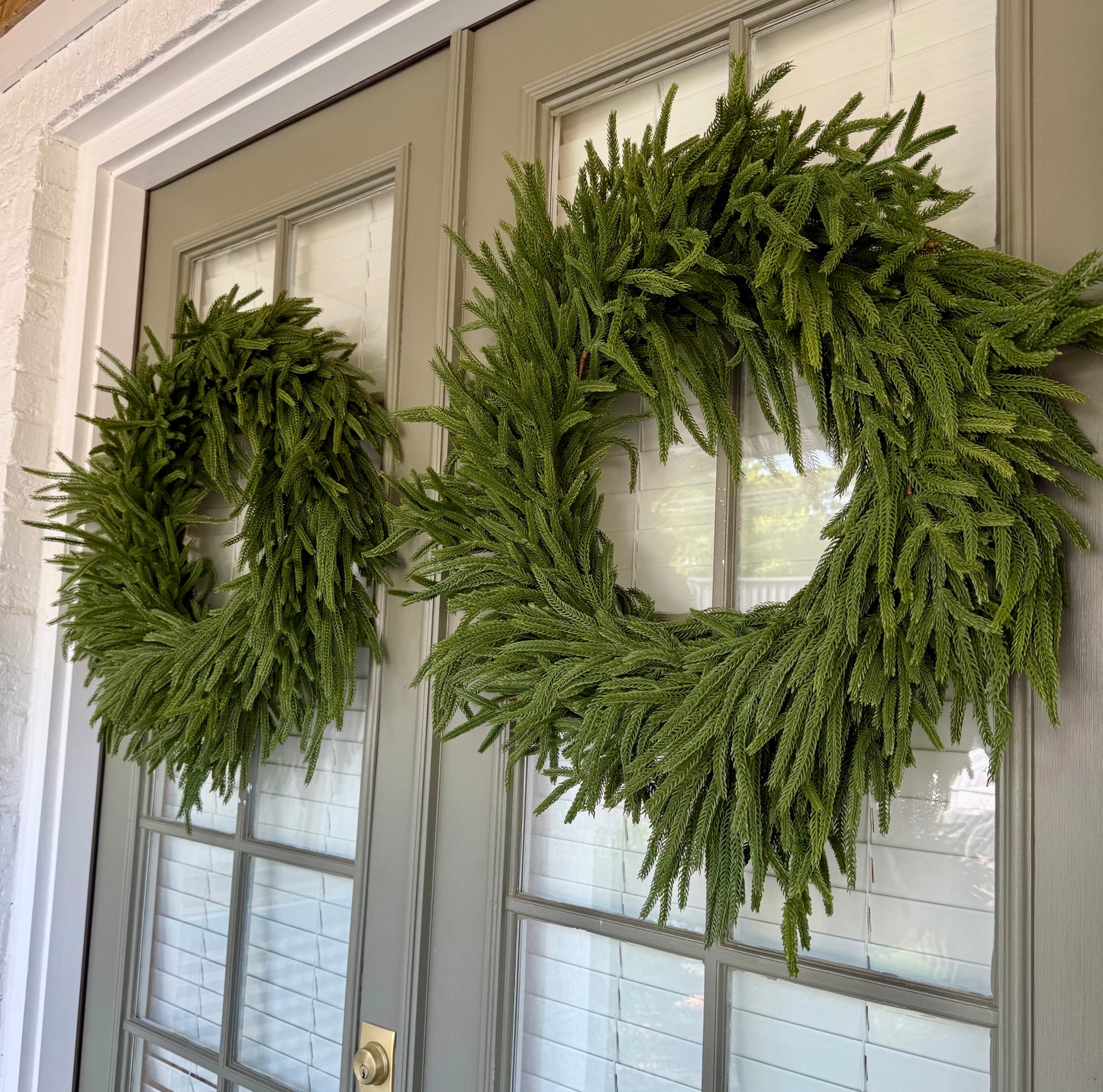 Faux mixed pine wreath. Real feel. About 30 inches wide.