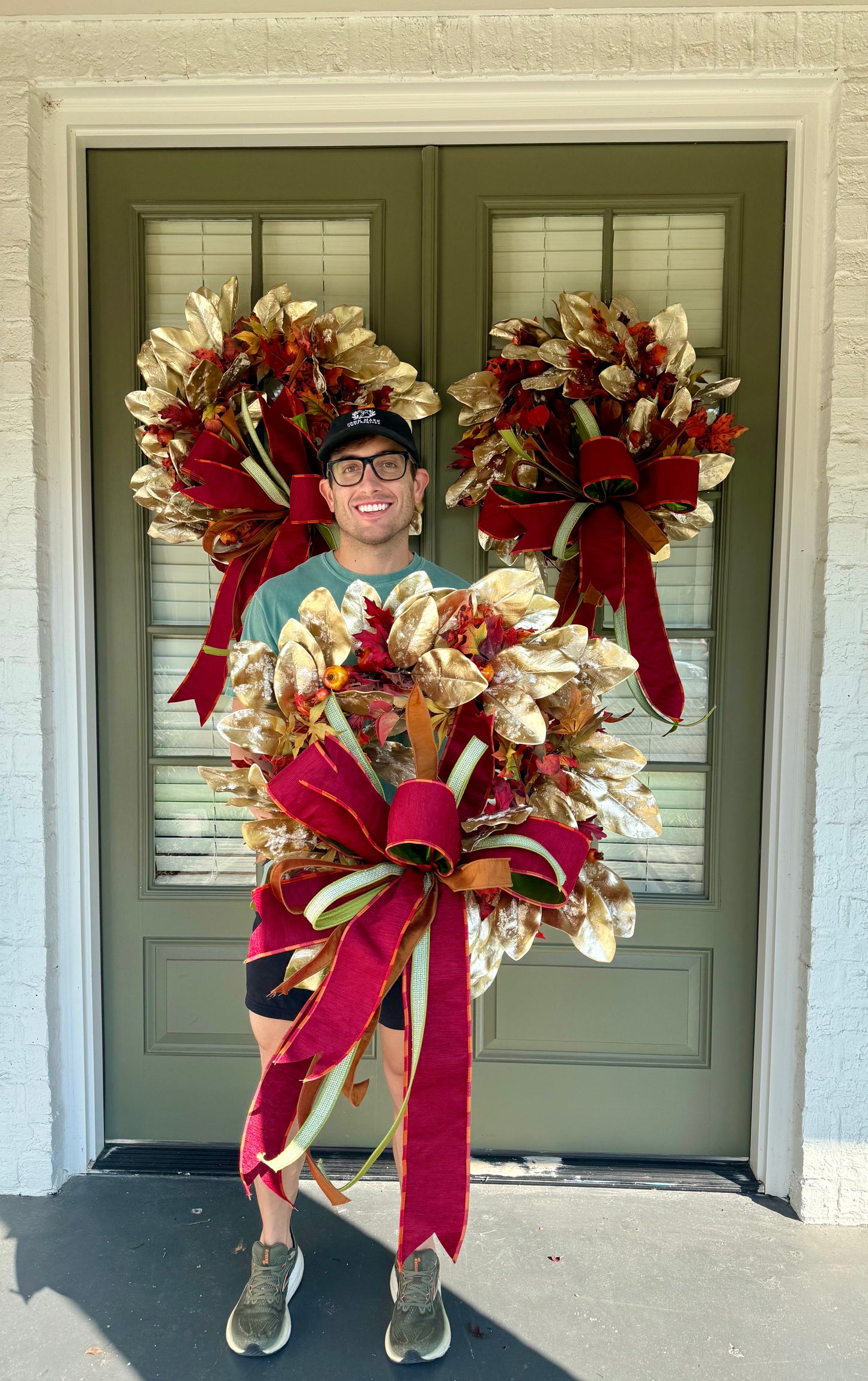 GOLD MAGNOLIA FALL WREATH. handmade by JME with a hand tied JME bow. 24 inches