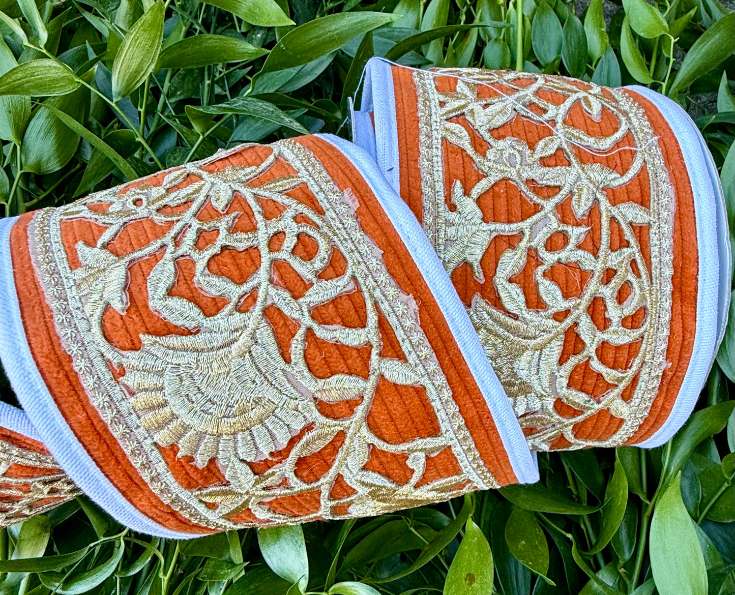 JME heavy wired ribbon. Orange Corduroy with a gold floral belt and cream piping with a burlap back. 4” x 5 yards