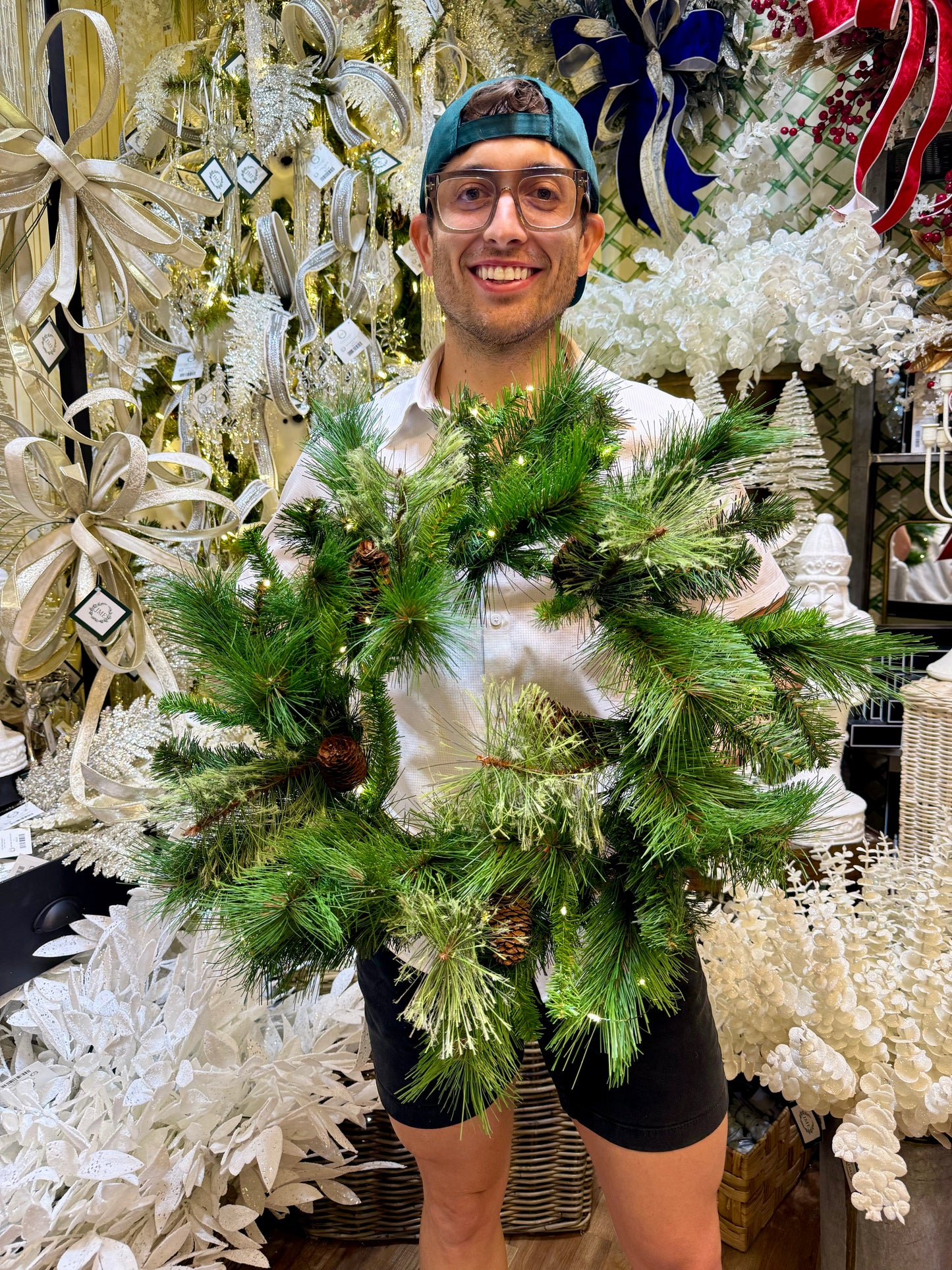 LED Lit 24" Wreath. Battery operated. Requires 3 AA batteries.
