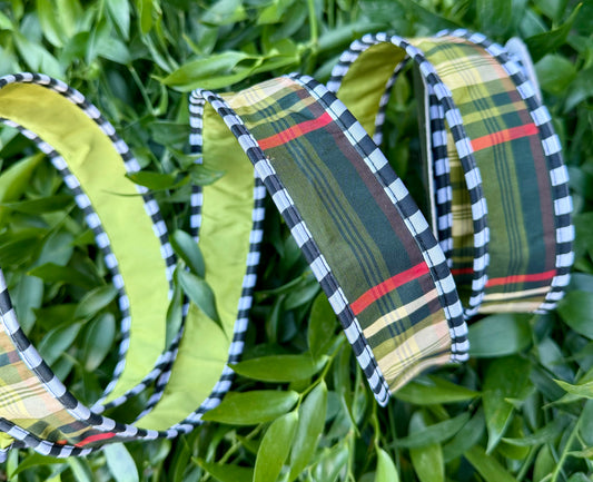 JME heavy wire ribbon. Black and green plaid with black and white, checked piping and back with green taffeta . 1.5“ x 10 yards.