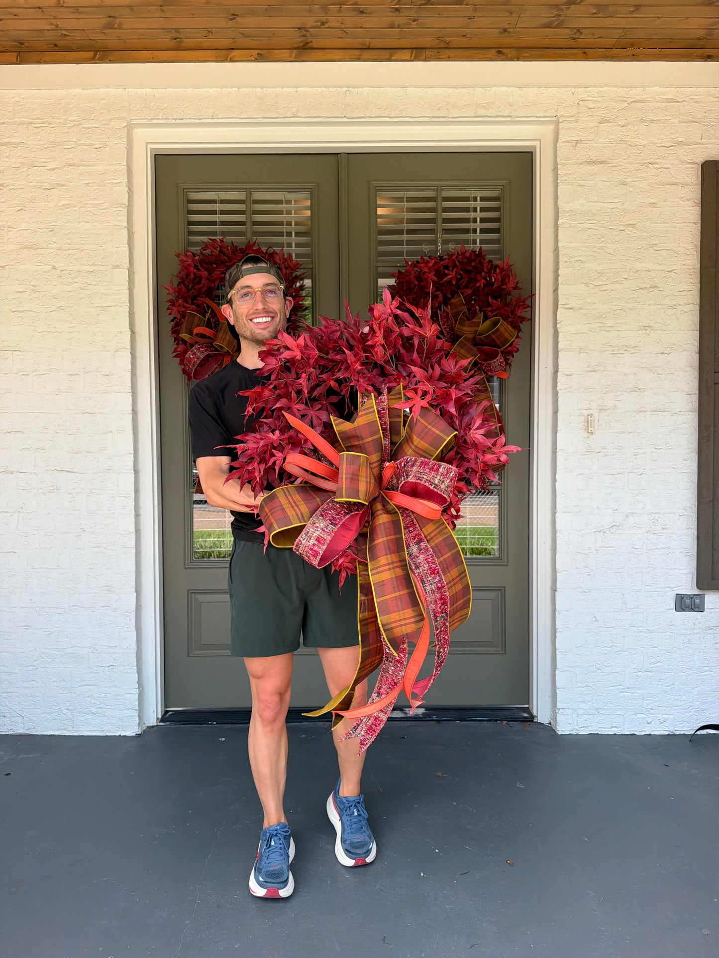 Red maple leaf wreath. Paired with a JME hand tied plaid fall bow. About 24 inches in diameter. * some fluffing may be required upon receiving.