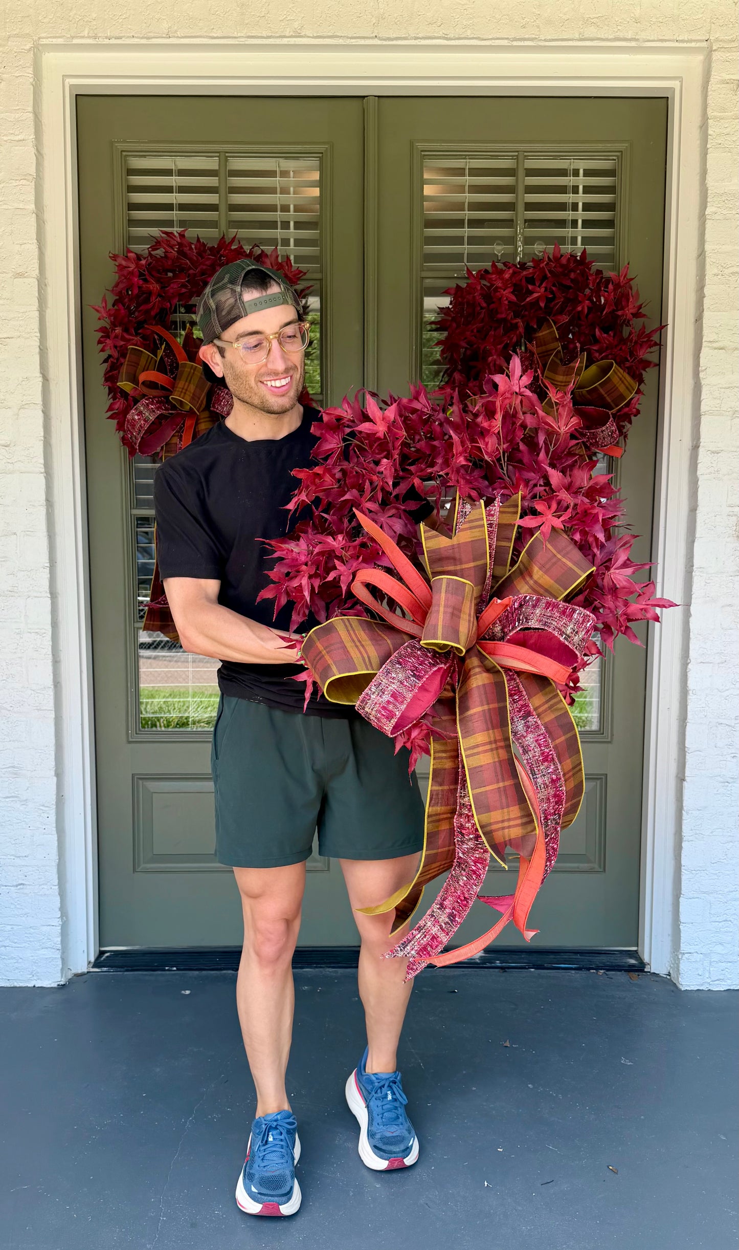 Red maple leaf wreath. Paired with a JME hand tied plaid fall bow. About 24 inches in diameter. * some fluffing may be required upon receiving.