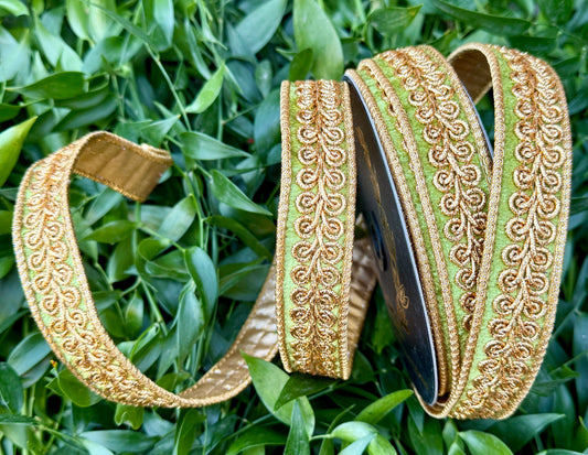 JME heavy wired ribbon. Apple Green velvet with gold embroidered design and back with gold metallic. 1“ x 10 yards.