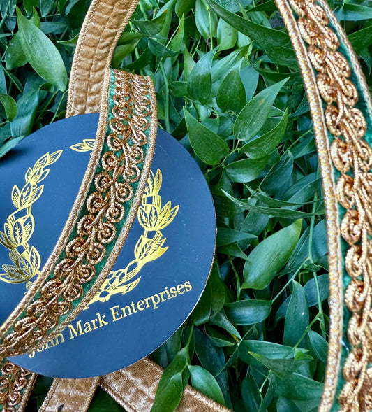 JME heavy wired ribbon. Green velvet with gold embroidered design and back with gold metallic. 1“ x 10 yards.