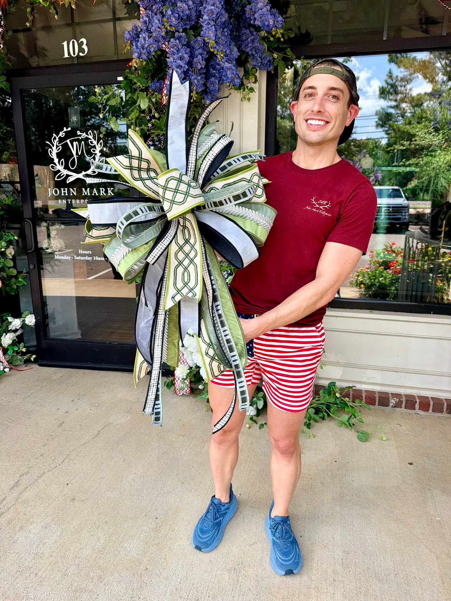 JME lux ribbon bow made with greens, tans, and neutral tones. Hand-tied by JME. Approximately 22 inches wide and 32 inches long.