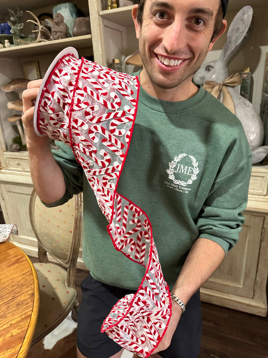 Appliquéd Red/White Candy cane on sheer Ribbon with Red trim. 4in by 10 yards.