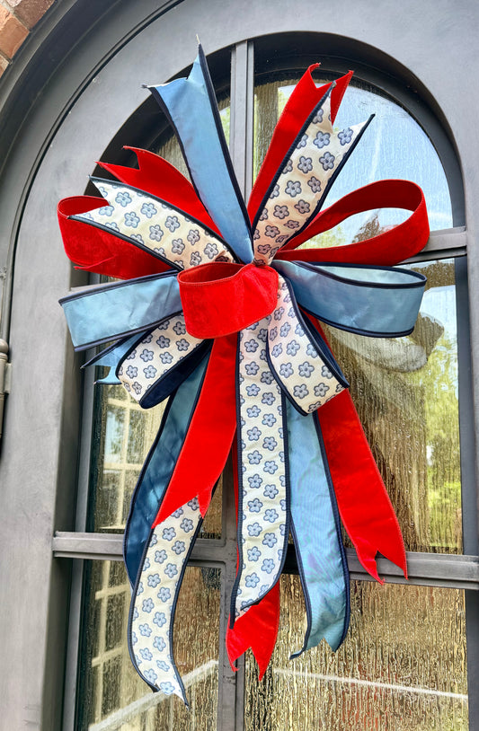 JME patriotic FLOWER bow. Hand-tied by JME. Approximately 22inches wide and inches 24inches long.