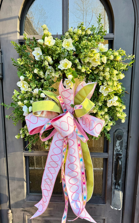 JME boxwood and white hellebore wreath. Paired with a JME hand tied bow. About 30 inches in diameter.