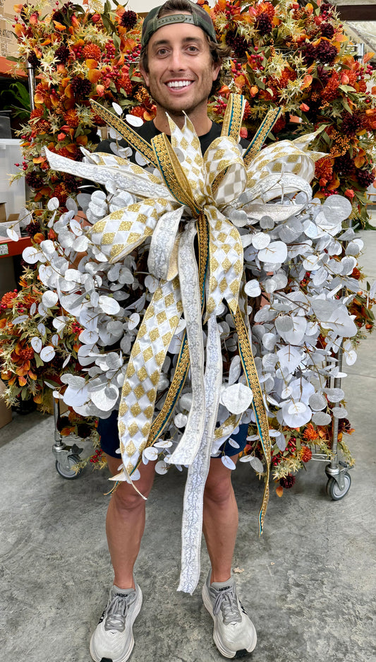 Faux shimmer Silver leaf wreath. With hand tied bow. 24 inches in diameter.