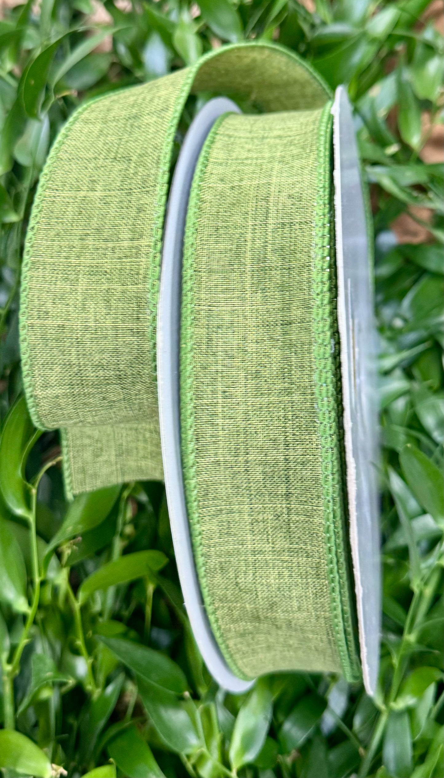 Green linen wired ribbon. 1.5” x 50 yards.