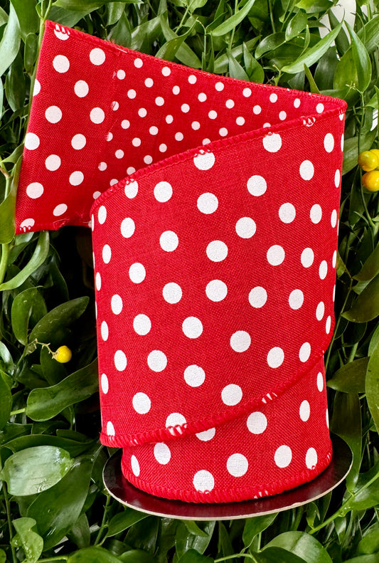 Red polkadot wired ribbon backside of the ribbon has smaller polkadots and the front side has larger. 4“ x 10 yards. ￼