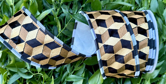 JME heavy wired ribbon. Velvet and metallic gold and black Geo print. With white backing. 2.5“ x 10 yards.