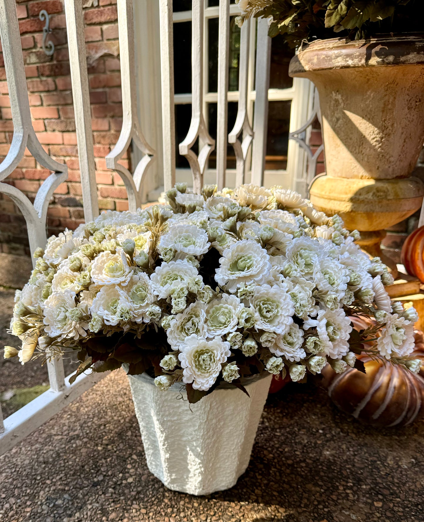 Faux white mum pot filler.