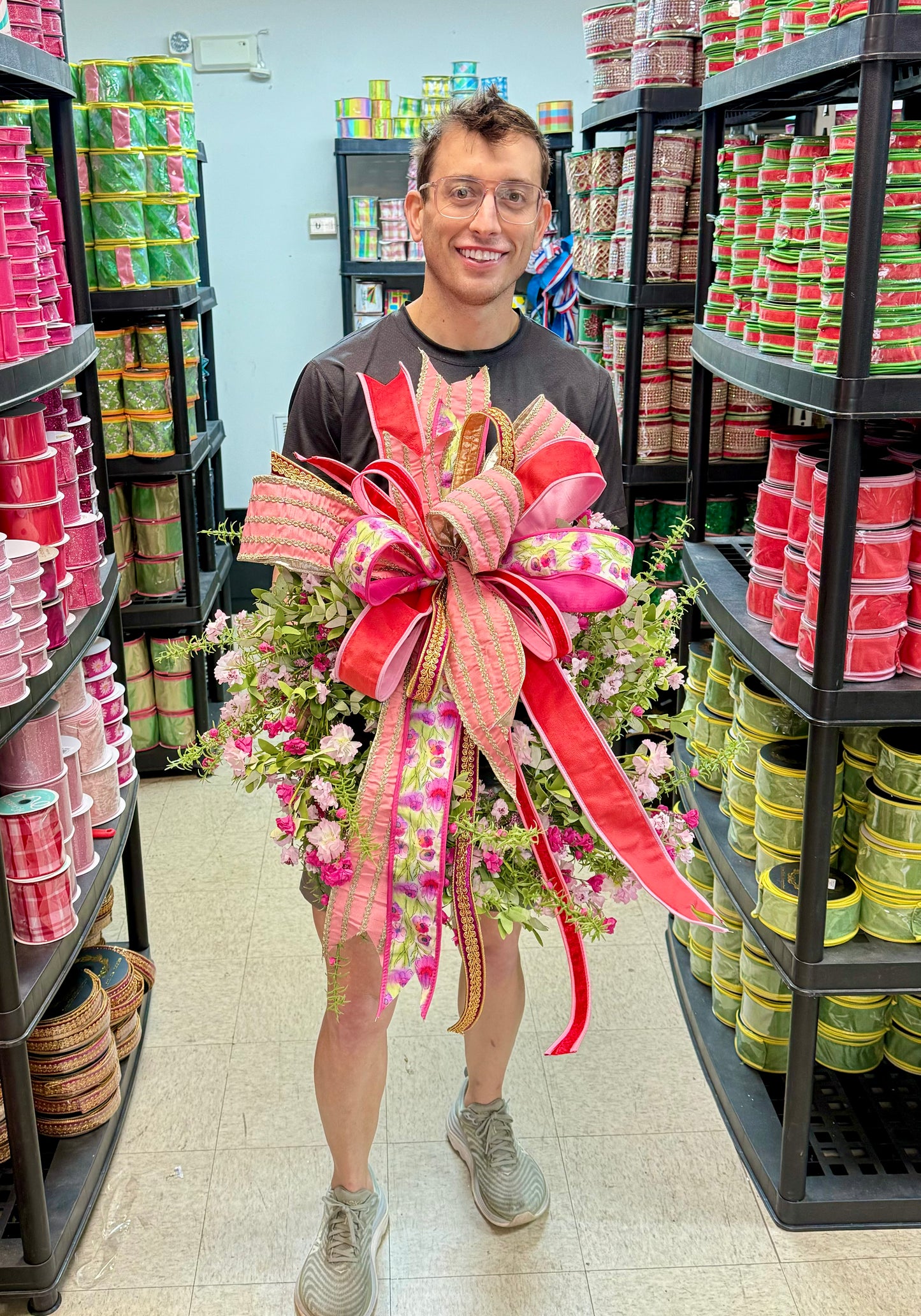 Pretty In Pink Wreath. With JME hand tied bow. Approximately 24 inches. *some fluffing of bow might be required upon arrival.*