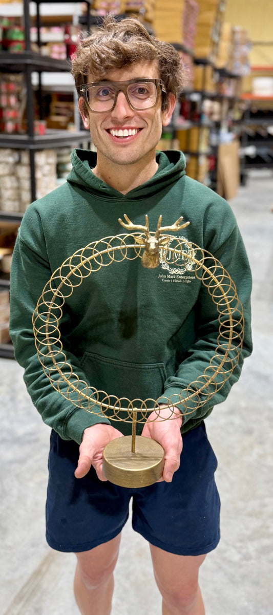 Gold deer card holder.