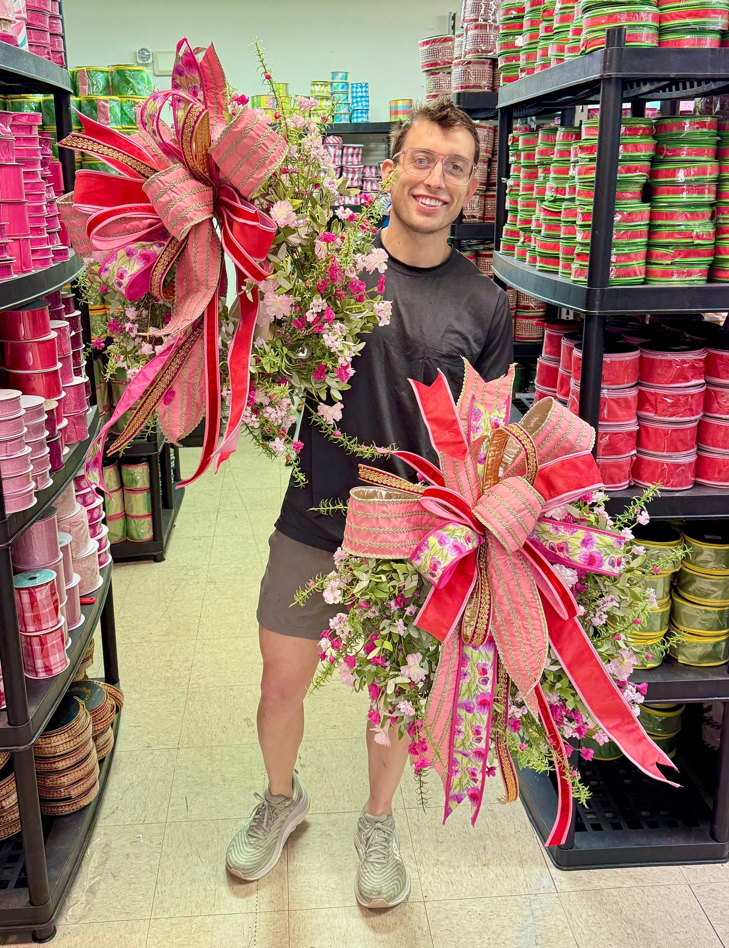 Pretty In Pink Wreath. With JME hand tied bow. Approximately 24 inches. *some fluffing of bow might be required upon arrival.*