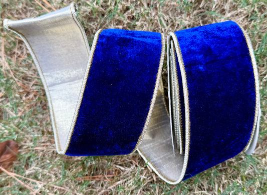 JME heavy wired ribbon. Royal blue velvet backed with gold metallic dupion. 2.5“ x 10 yards