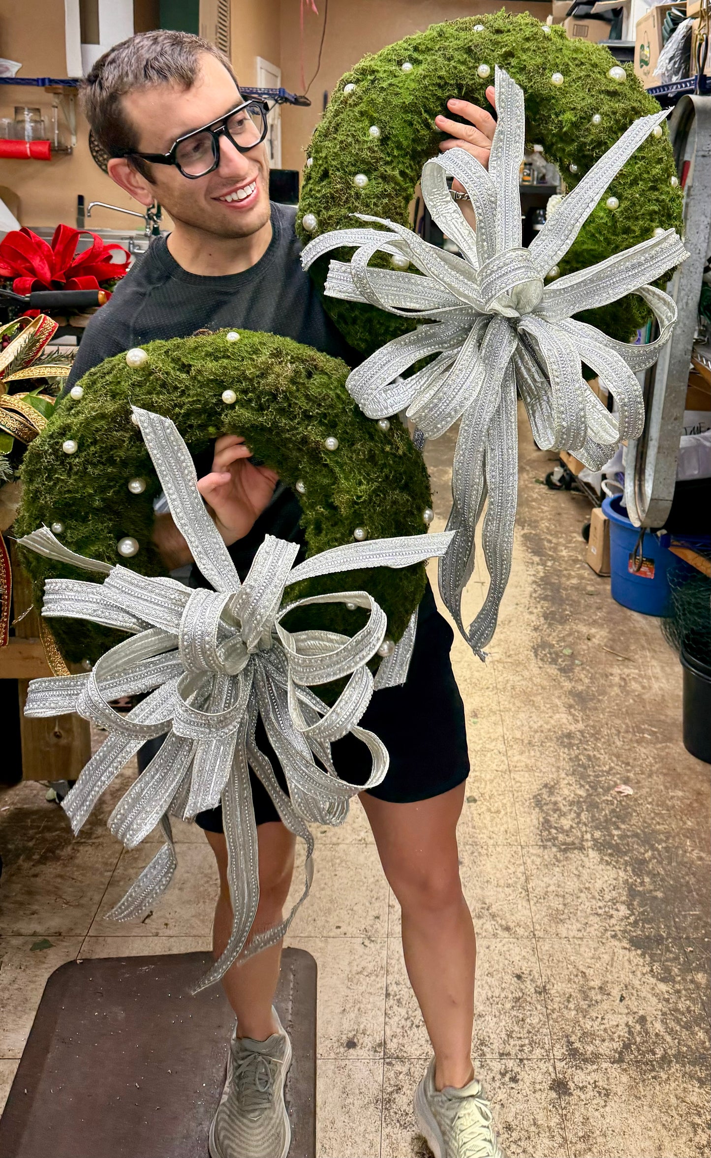 Moss wreath with pearls and a JM tied pearl ribbon bow. 20 inches wide.