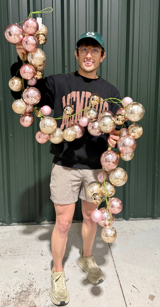 ROSE GOLD AND BLUSH PINK Ball garland 6 foot long. Perfect to add to any greenery garland. Easy to use.