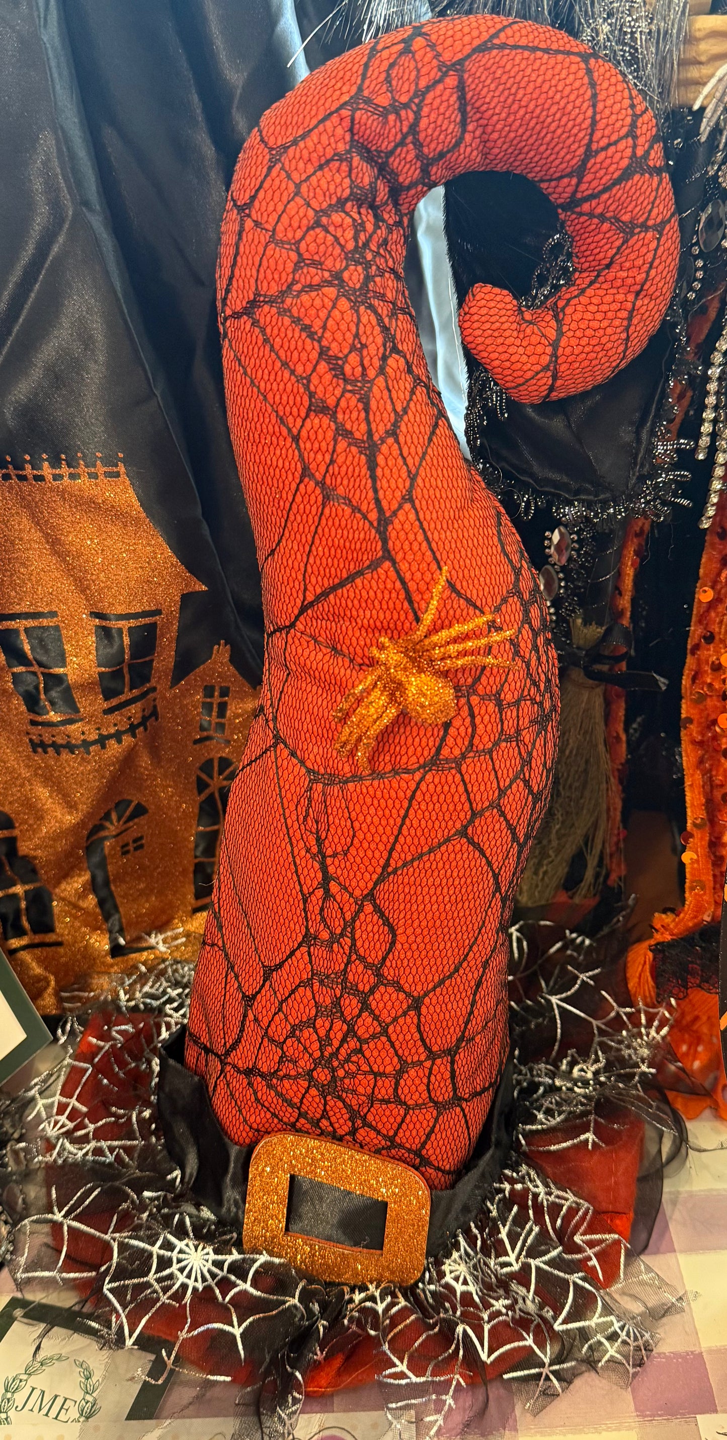 Orange spiderweb witch hat. 14 inches. Perfect for a table escaping or adding a little Halloween touch to a vignette. ￼