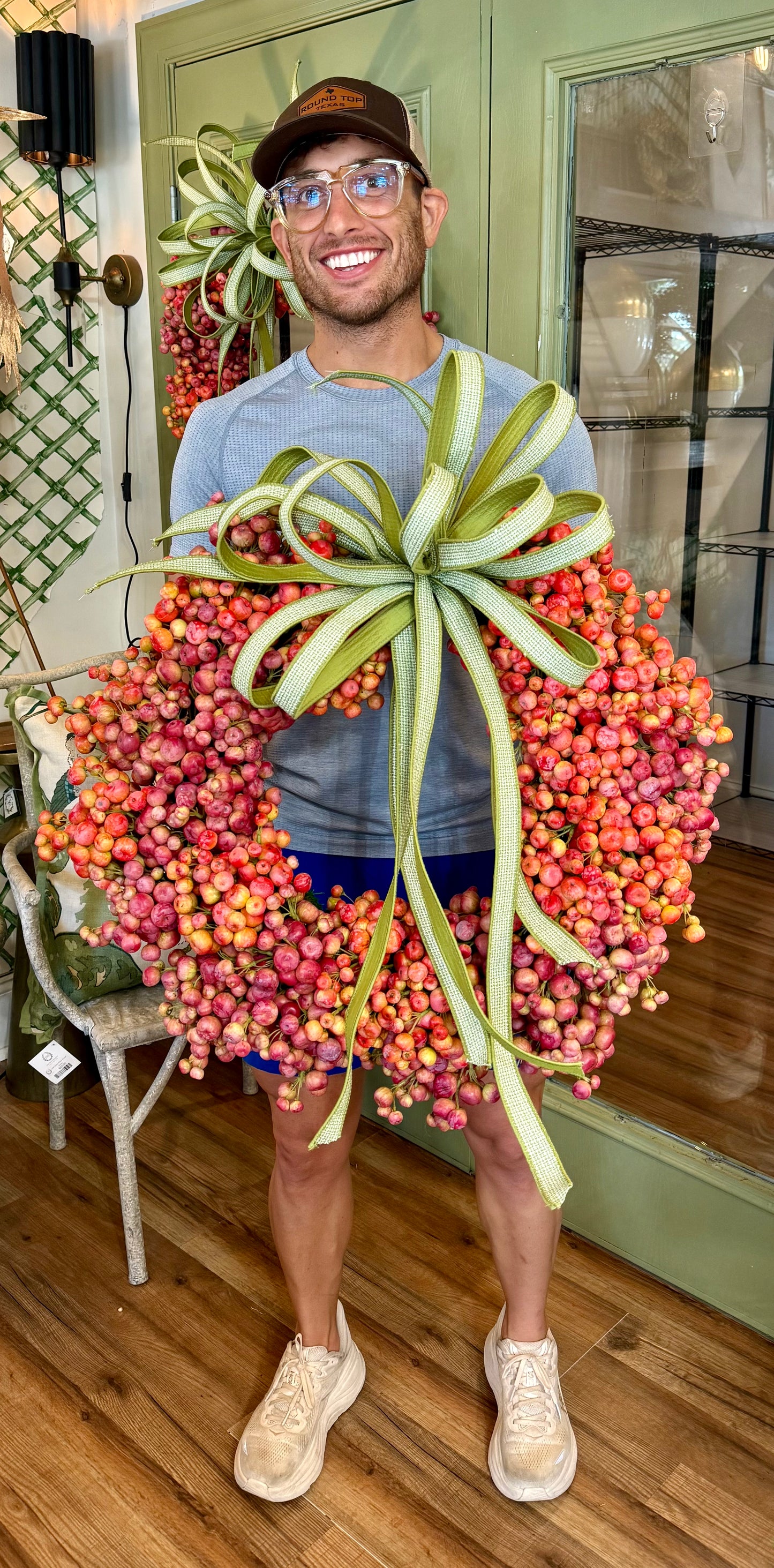 Hand made crabapple wreath with JME hand tied bow. About 24 inches wide.