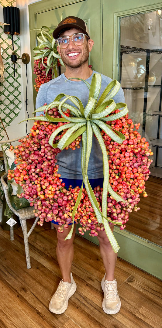 Hand made crabapple wreath with JME hand tied bow. About 24 inches wide.