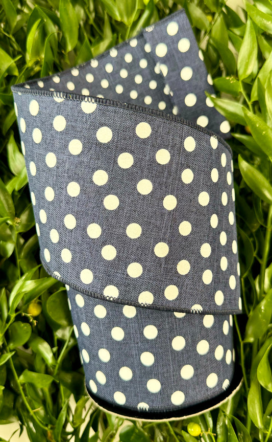 Navy polkadot wired ribbon. The polkadots on the backside are smaller than the polkadots on the front side. Double sided 4” x 10 yards.