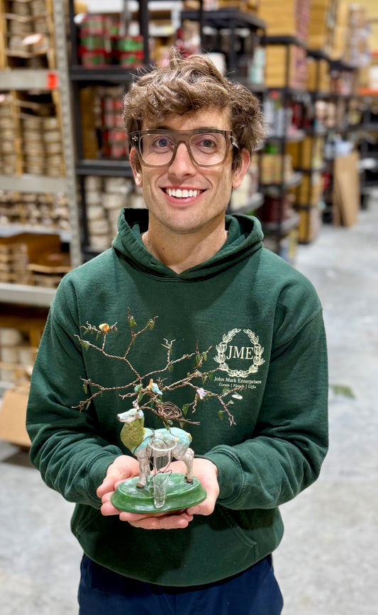 Unique bud vase holder. Deer with birds and leaf antlers. Handmade. About 10 inches tall.