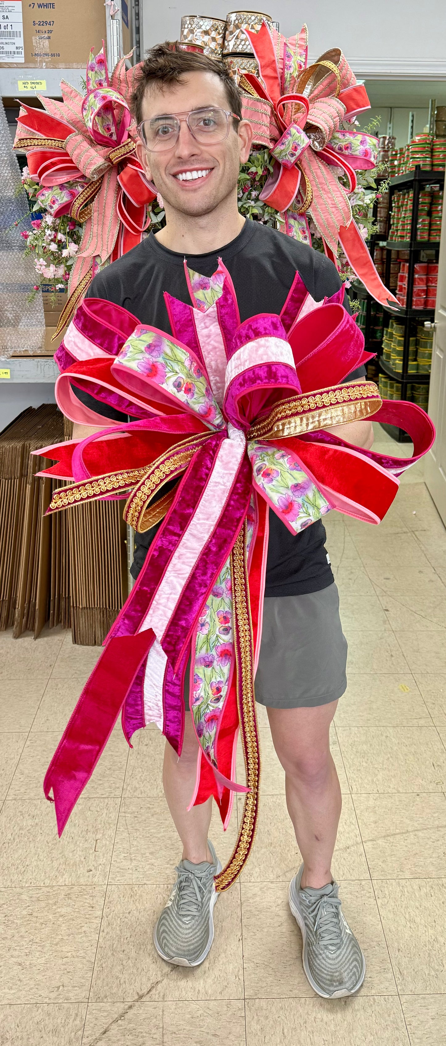 The velvet valentine bow with floral ribbon. Hand tied by JM. Some fluffing might be required upon receiving.