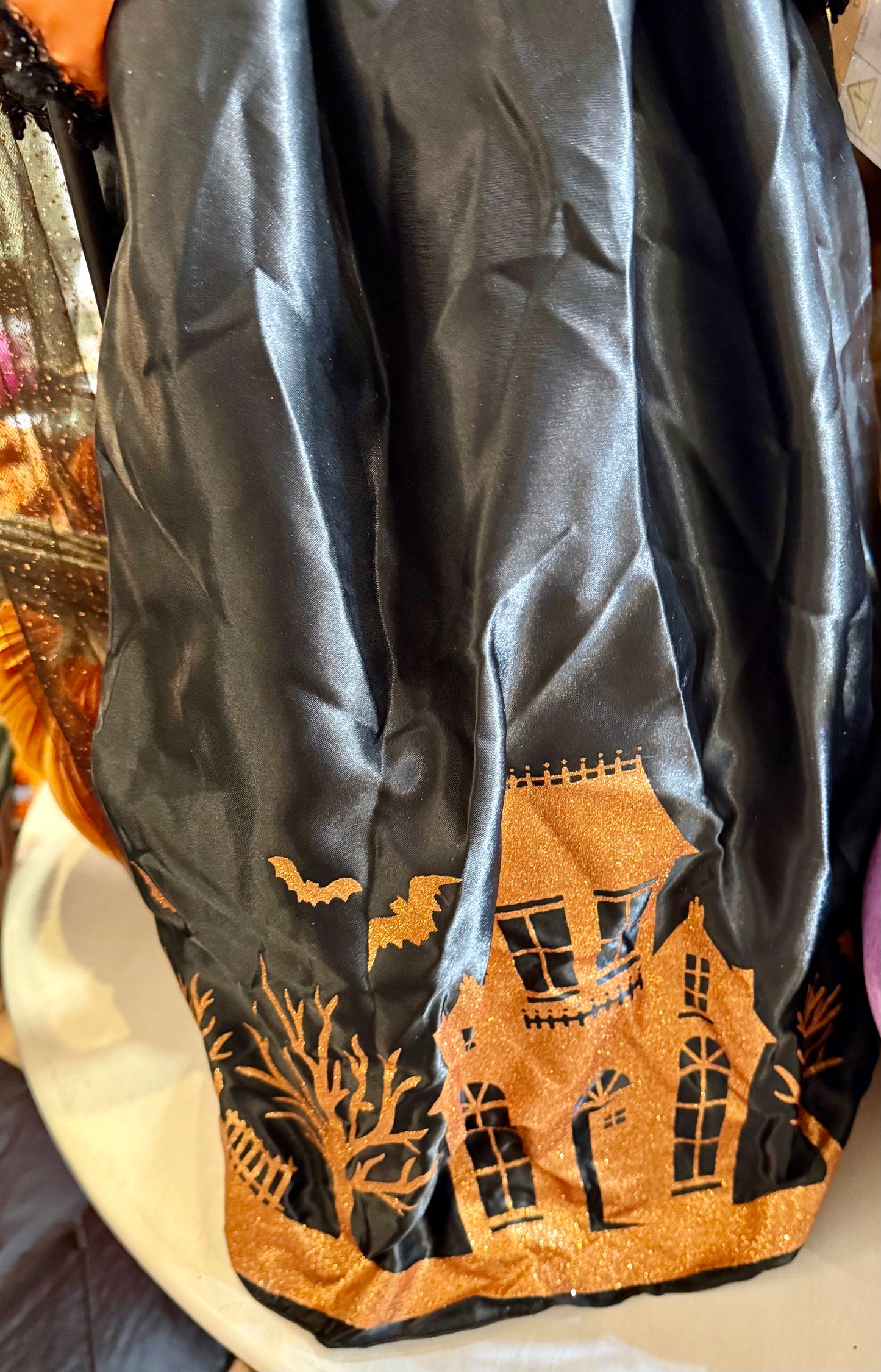 Tall witch figurine, holding a light up jack-o’-lantern. 42 inches tall. Has a Crow on her hat!