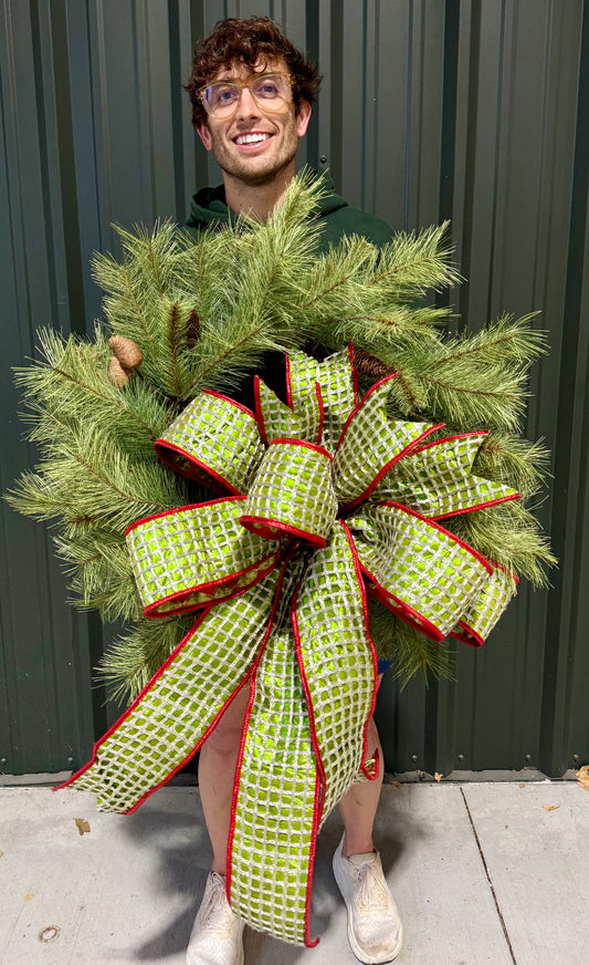 24 inch lush PINE wreath paired with a JME handtied bow.