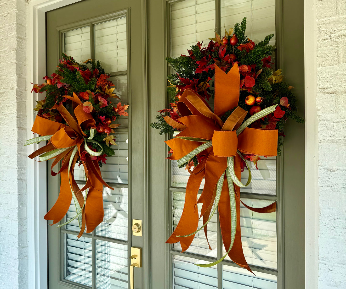 Spruce and pomegranate FALL WREATH. handmade by JME with a hand tied JME bow. 24 inches