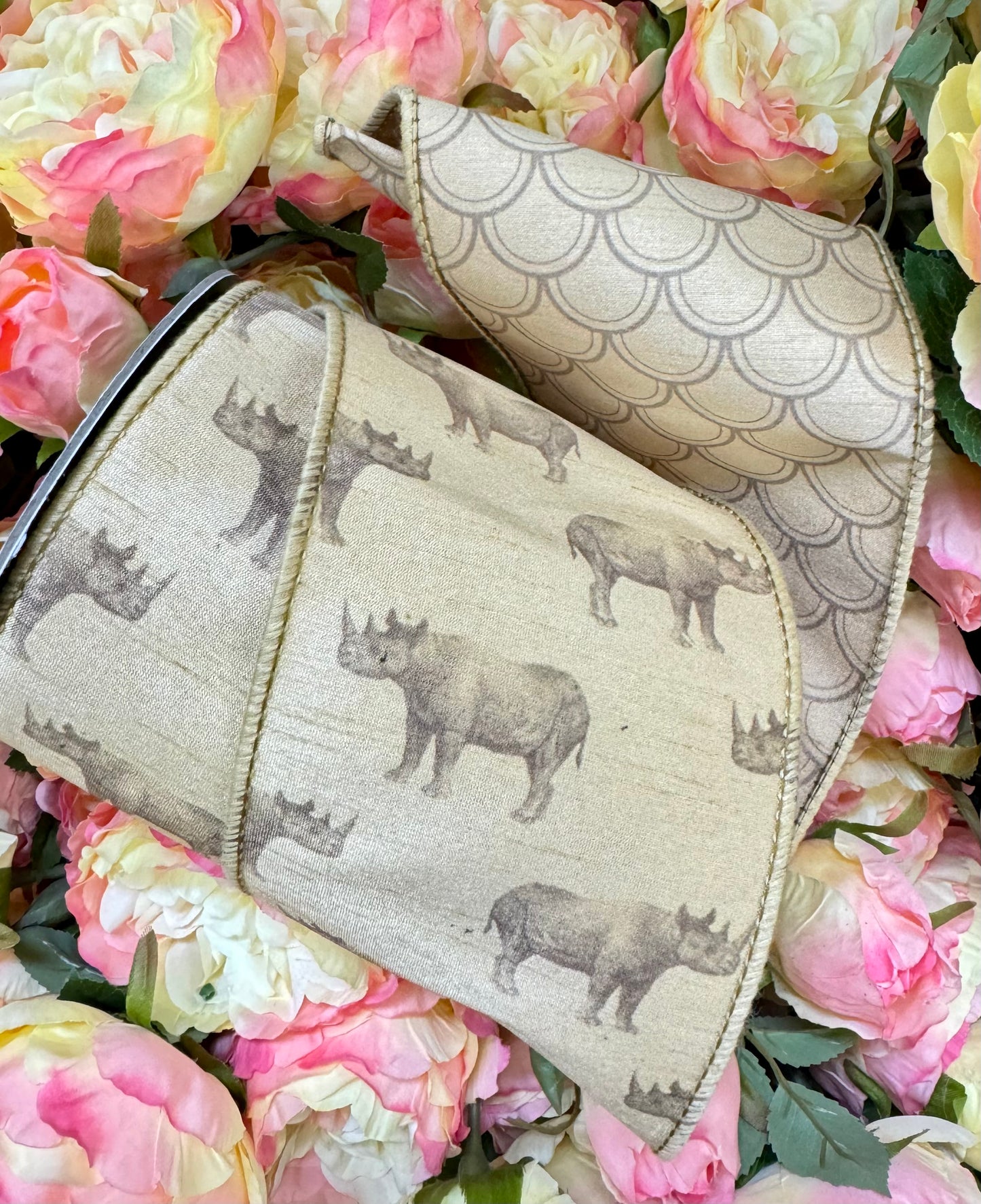 Rhino ribbon with Geo print on back wired. 4” x 10 yards.