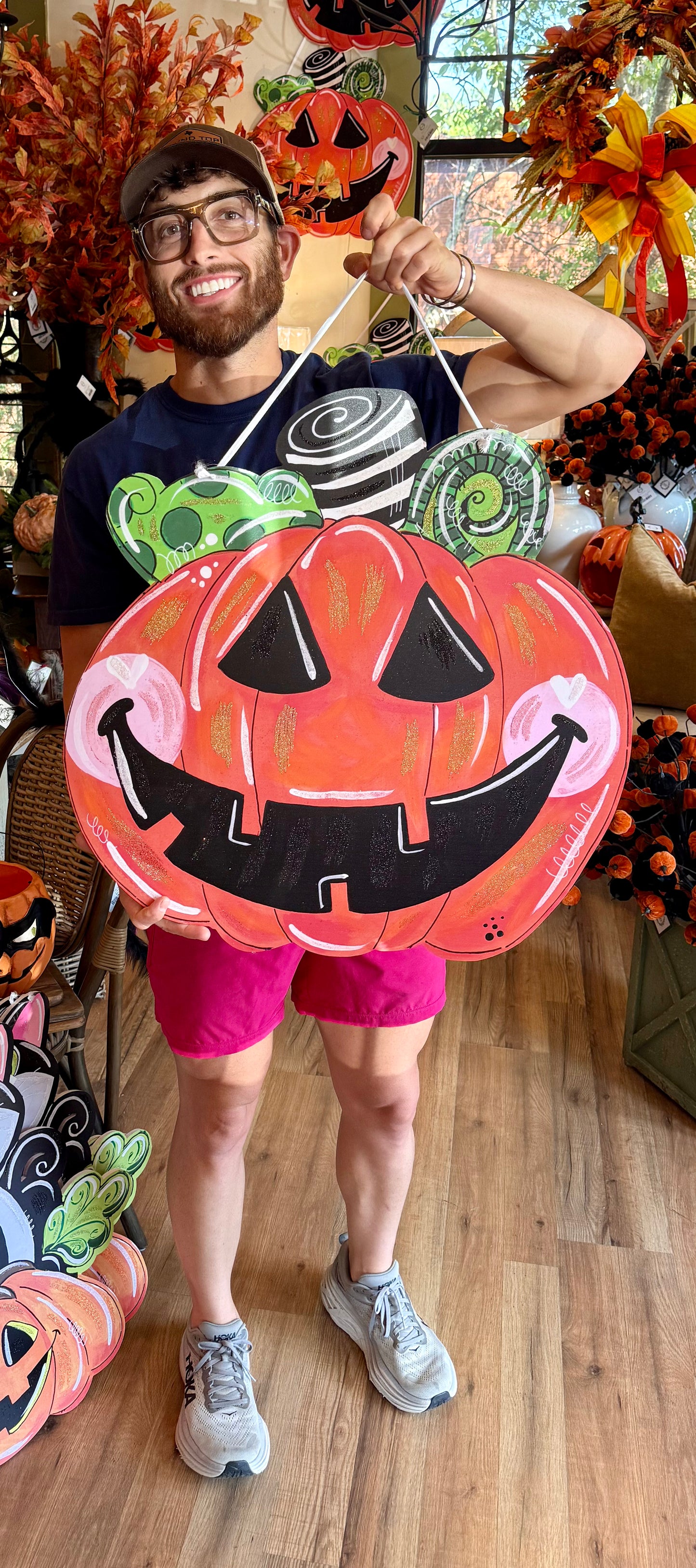 Artsy jack-o-lantern door hanger 24inches. Door hanger.