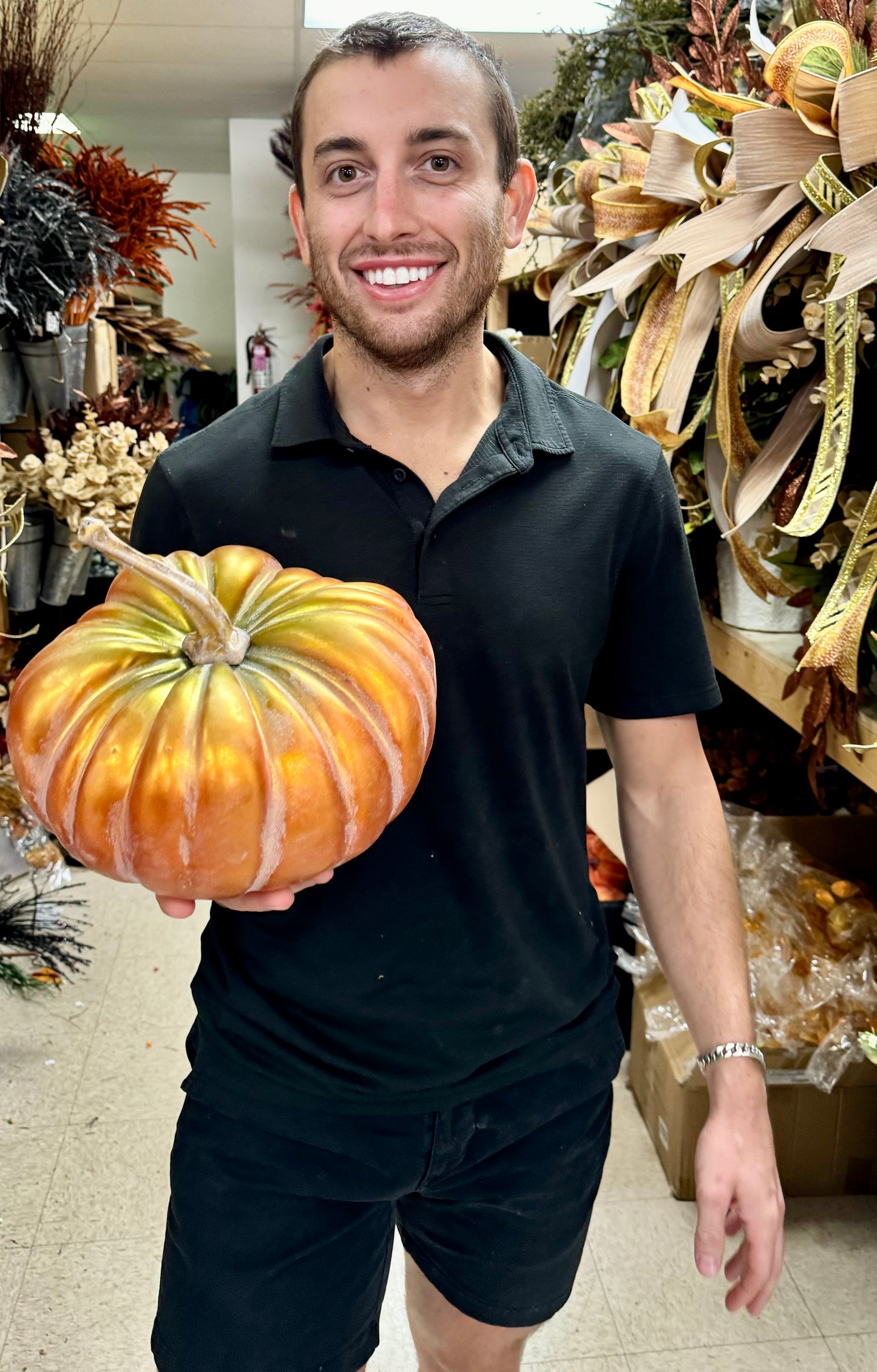 Orange and green pumpkin with gold stem. 9inches