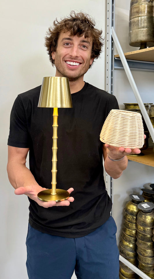 Gold LED cordless bamboo lamp with extra rattan shade. Comes with a charging cord. 14.5 inches tall by 4.5 inches diameter.