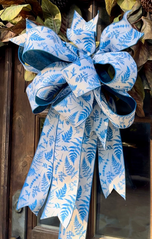 Blue fern bow. Some fluffing maybe required after receiving it.