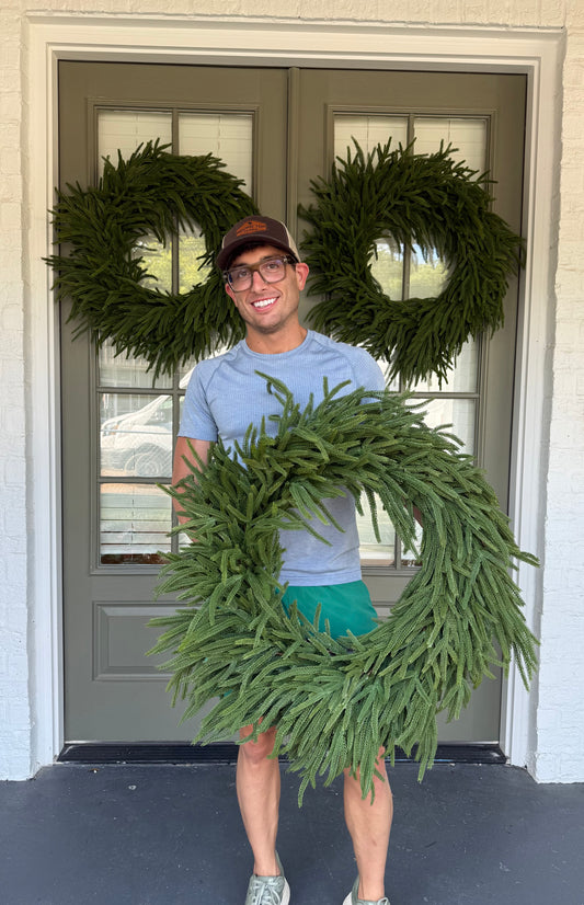 Faux mixed pine wreath. Real feel. About 30 inches wide.